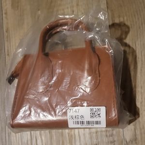 Small hand held purse, Brand new